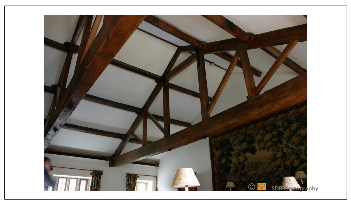 A old softwood Queens post truss